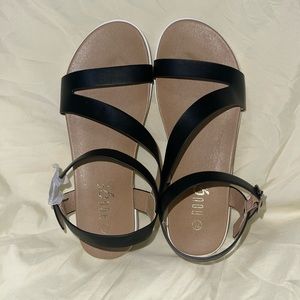 Black straps tan sandals
